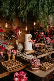 white and brown cake with candles on brown wooden table