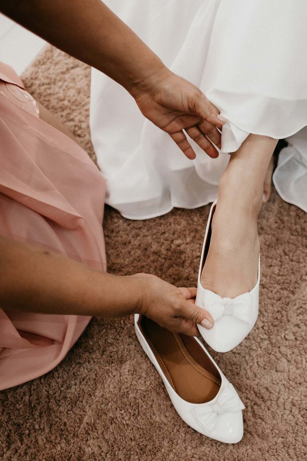 woman in white dress and white peep toe pumps