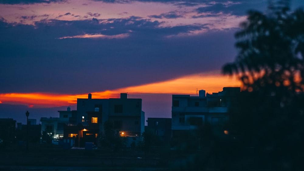 silhouette of buildings during sunset