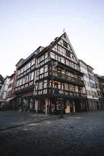 View of the historic Fachwerkhaus exterior in the heart of Quedlinburg's UNESCO site.