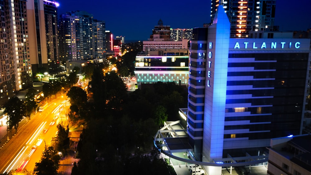 white and blue building during night time