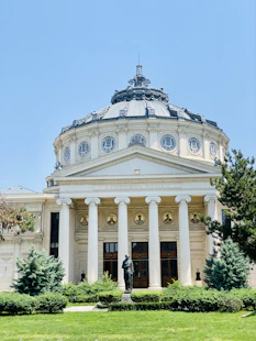 white and brown concrete building under blue sky during daytime