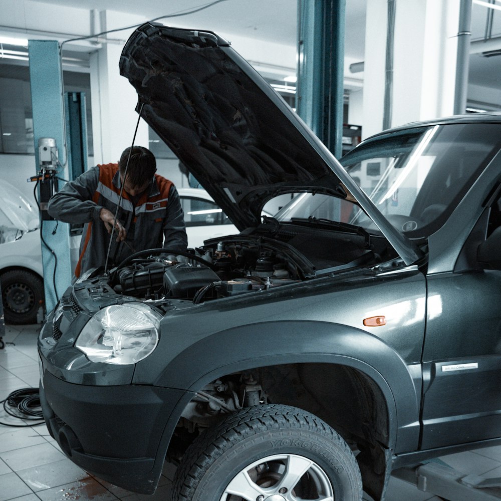 black suv in a garage