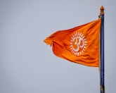 red and yellow flag on pole