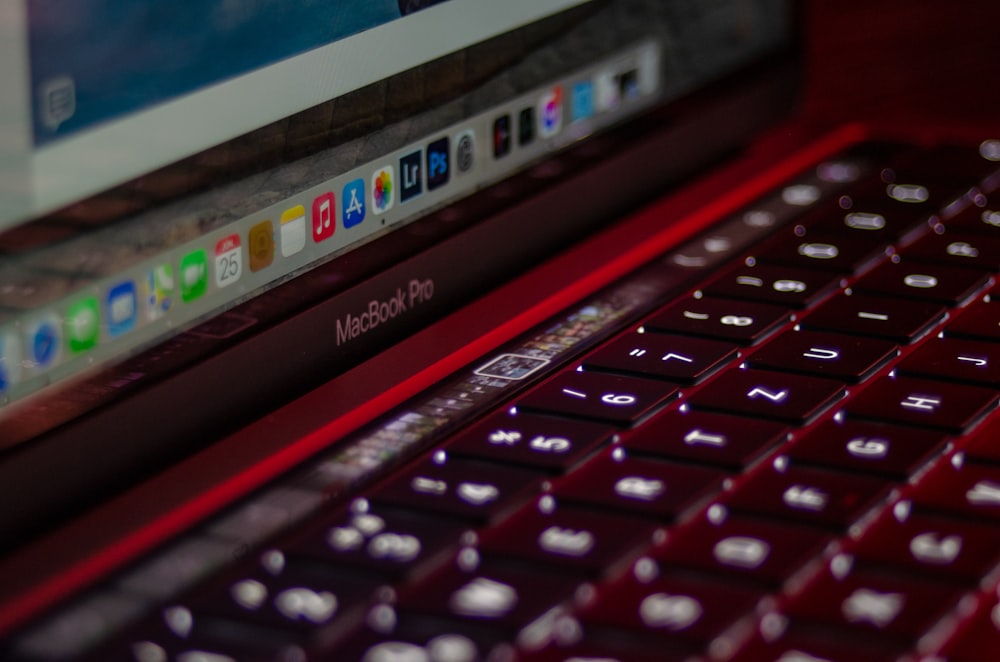 red and black toshiba laptop