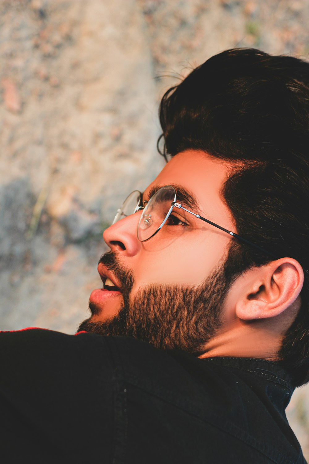 man in black framed eyeglasses