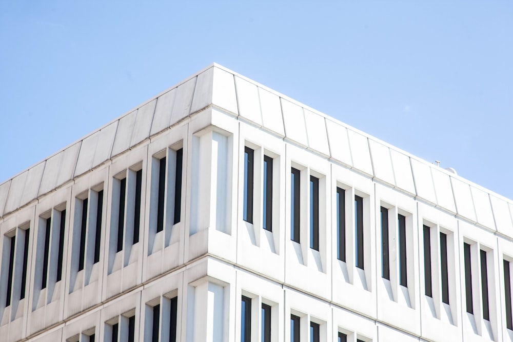 white concrete building under blue sky during daytime