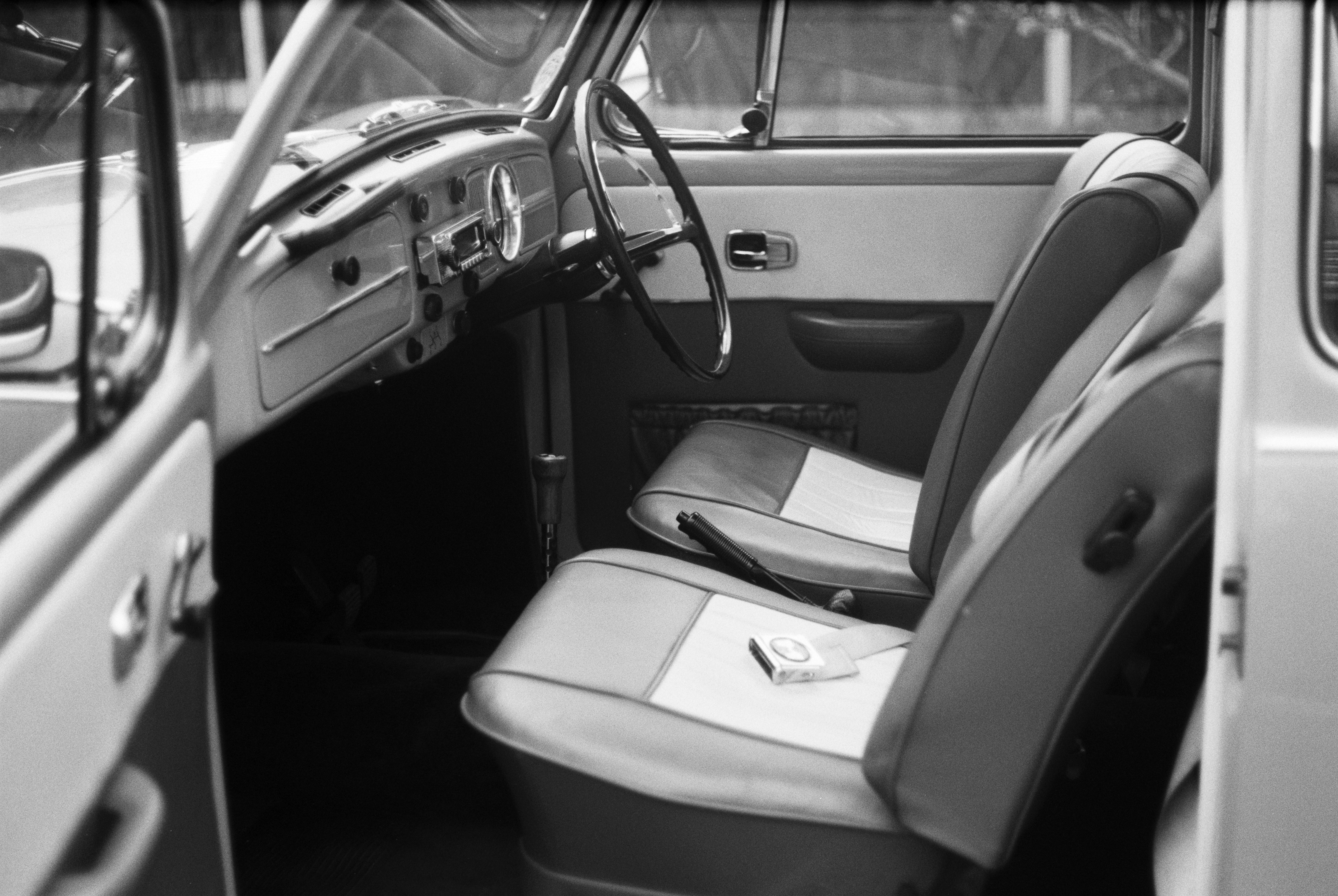 grayscale photo of car seat