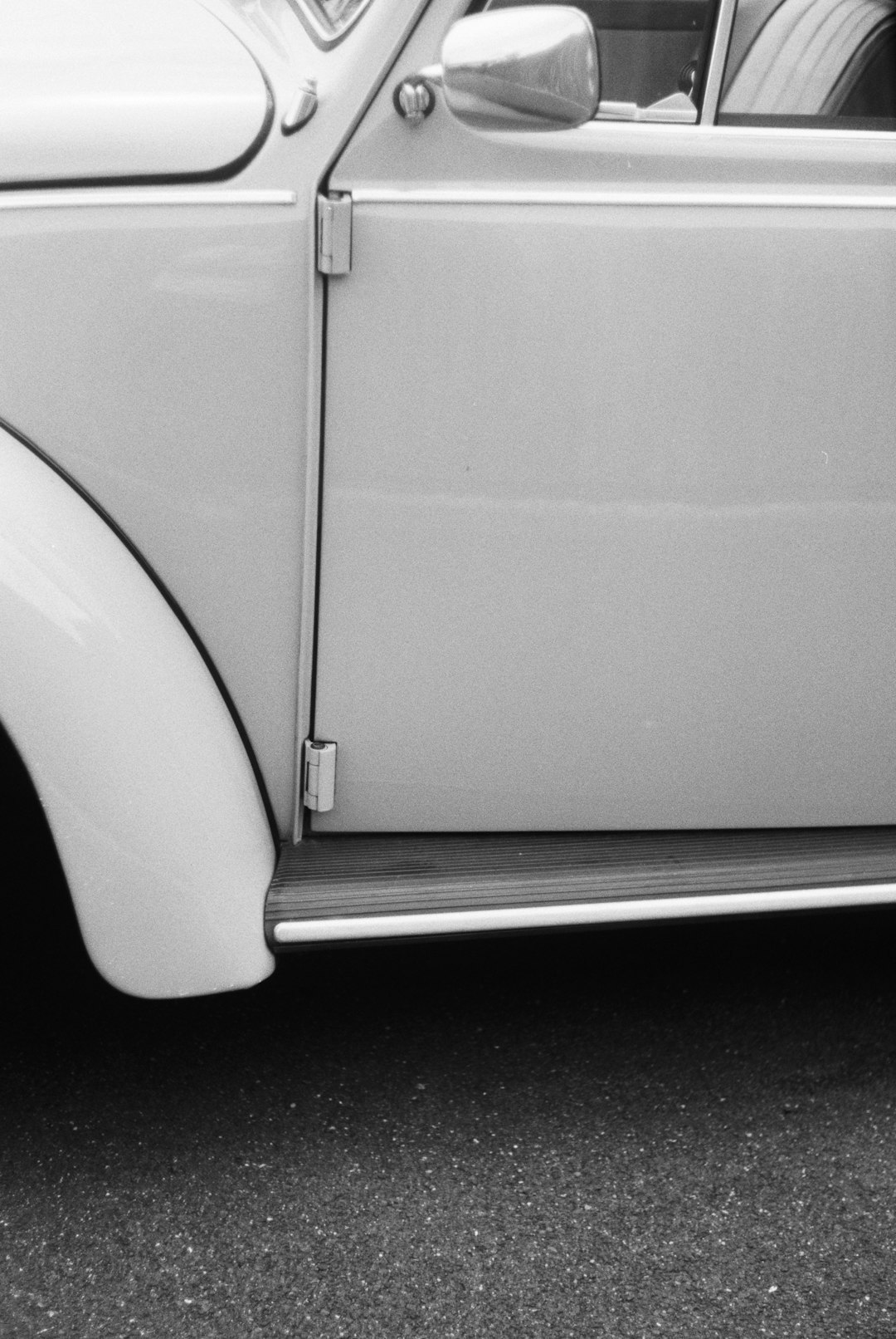 white car on black background