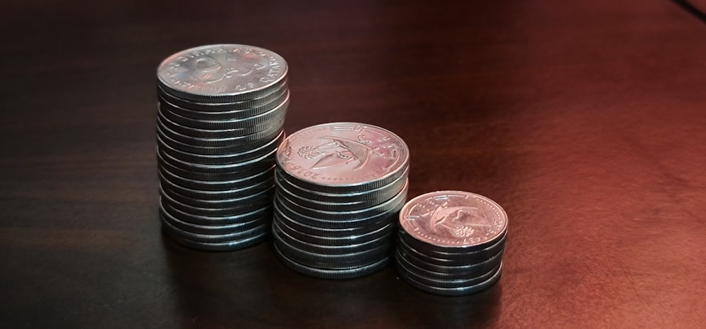 silver round can on brown wooden table