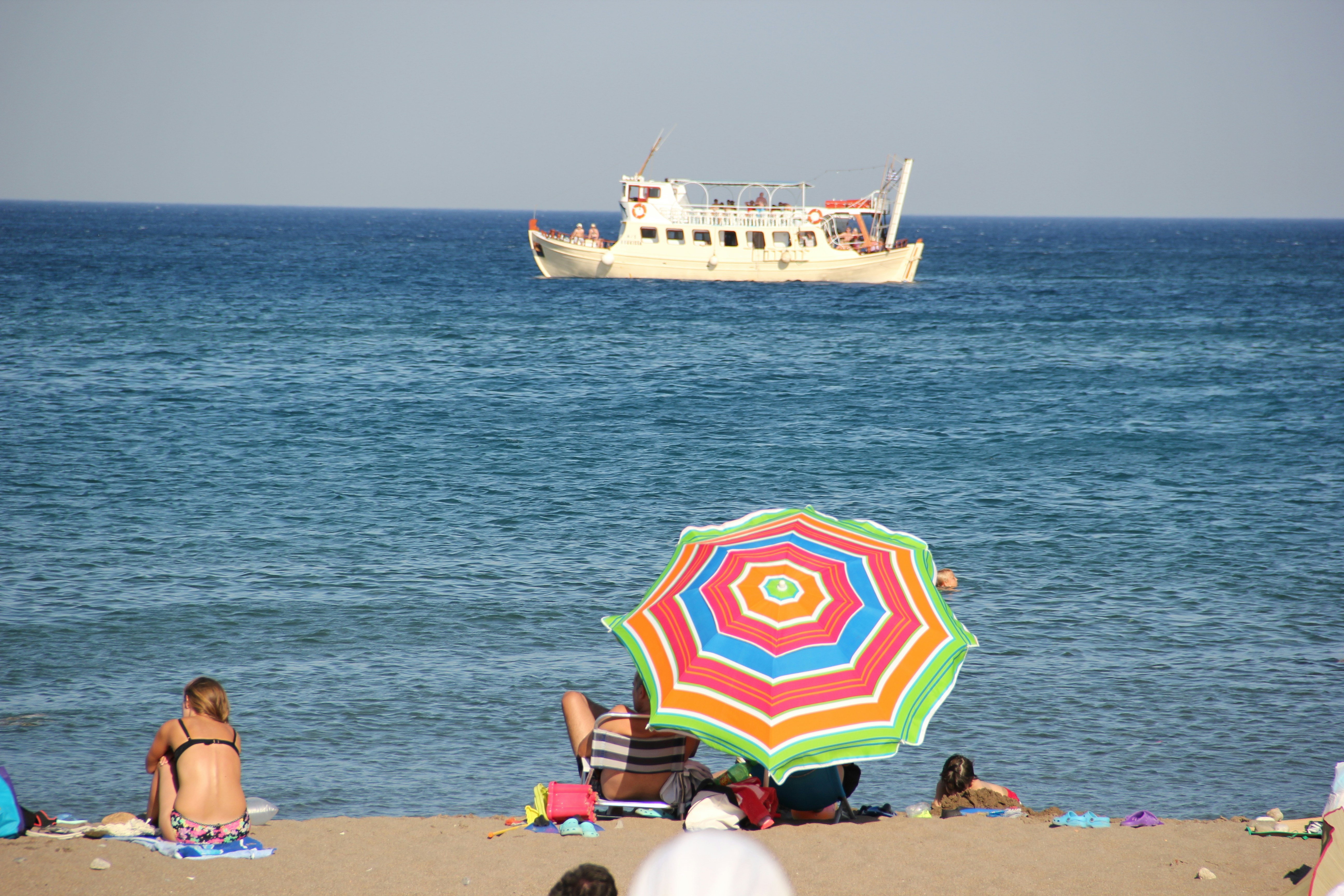people on beach during daytime