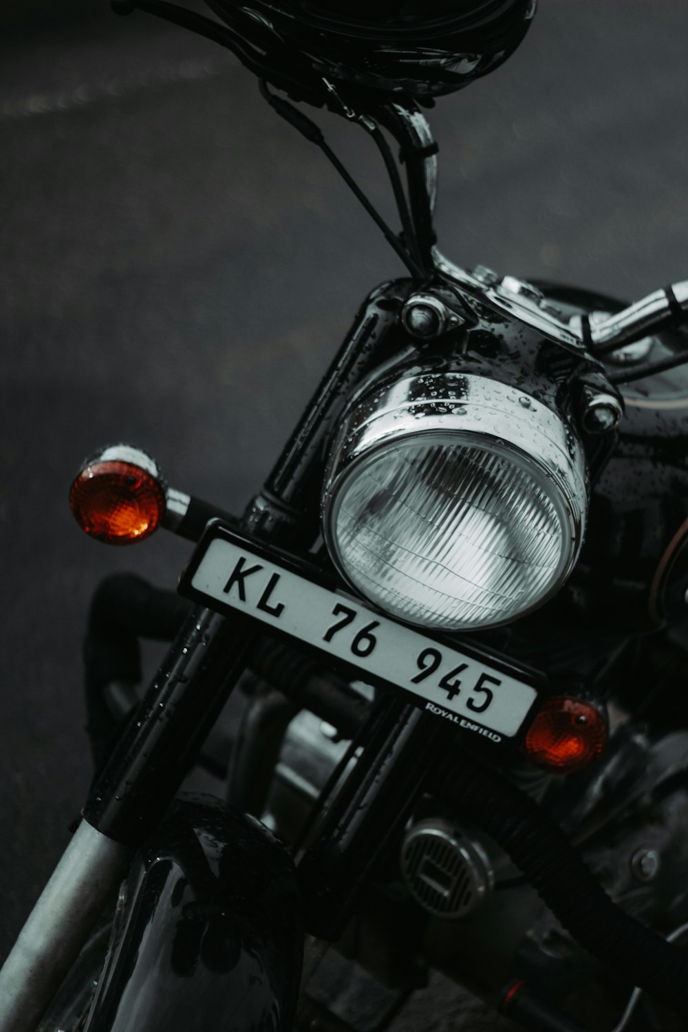 black and silver motorcycle with red light