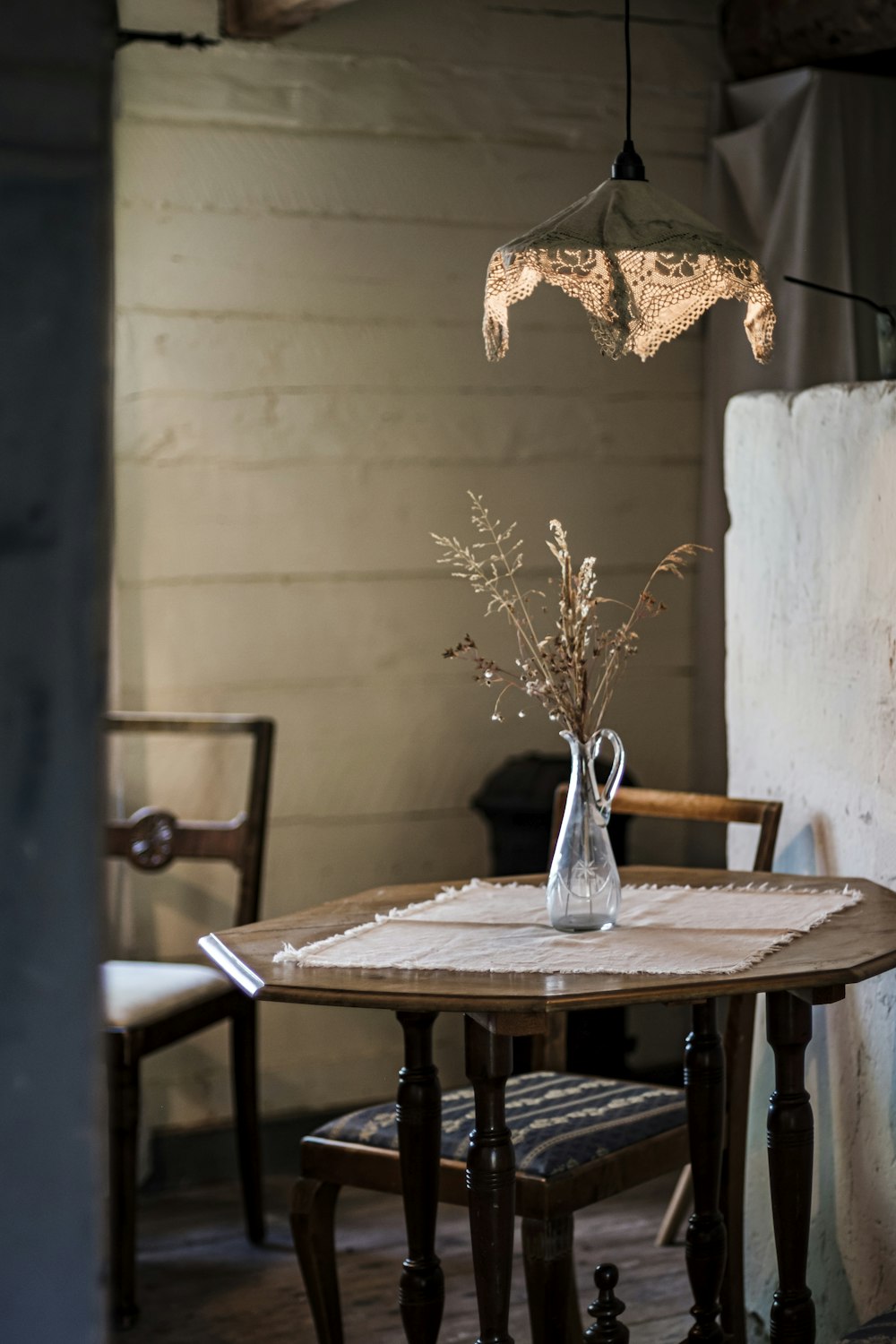 brown wooden table with brown wooden chairs