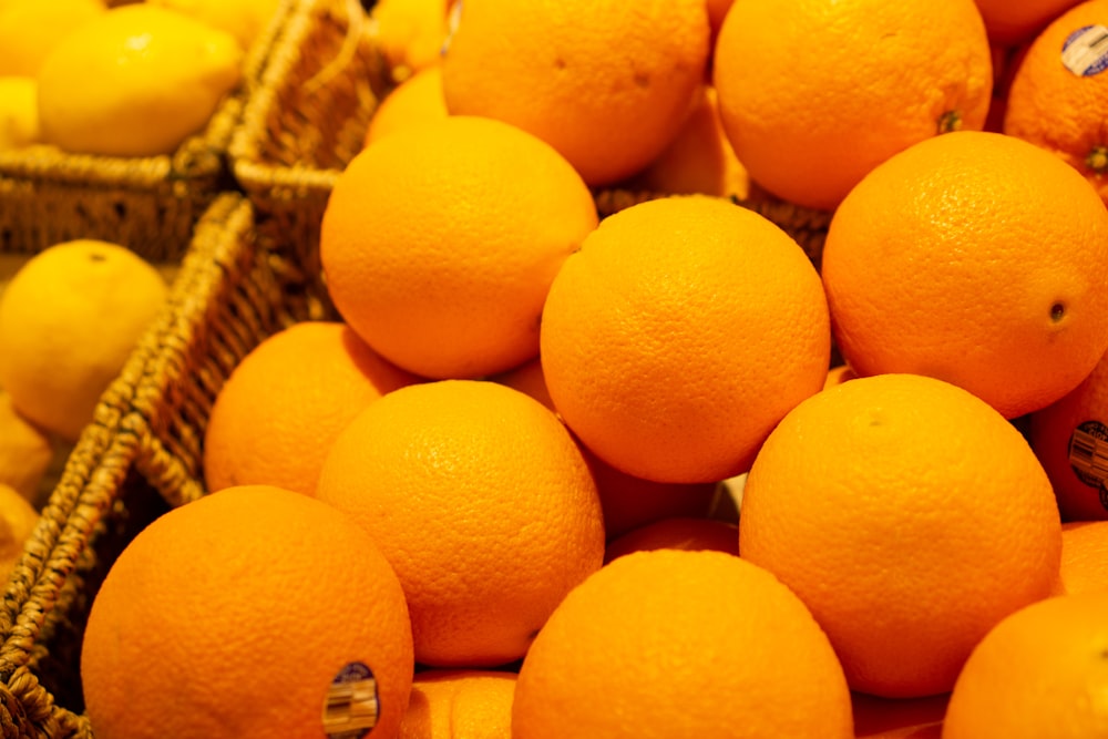 orange fruits on brown woven basket