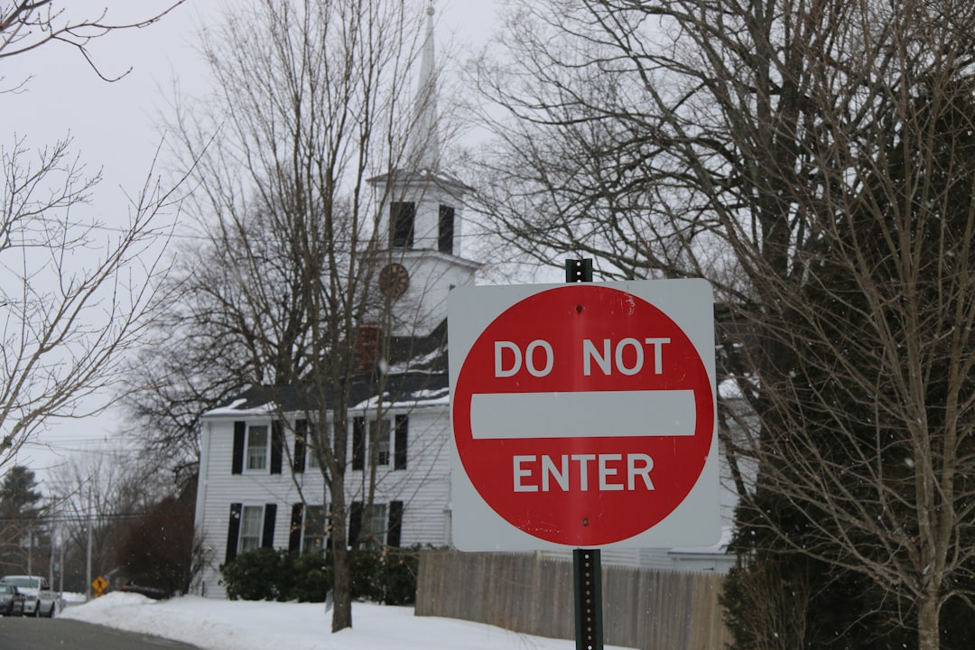 Do Not Enter sign with church steeple in background Maybe some mixed messages.