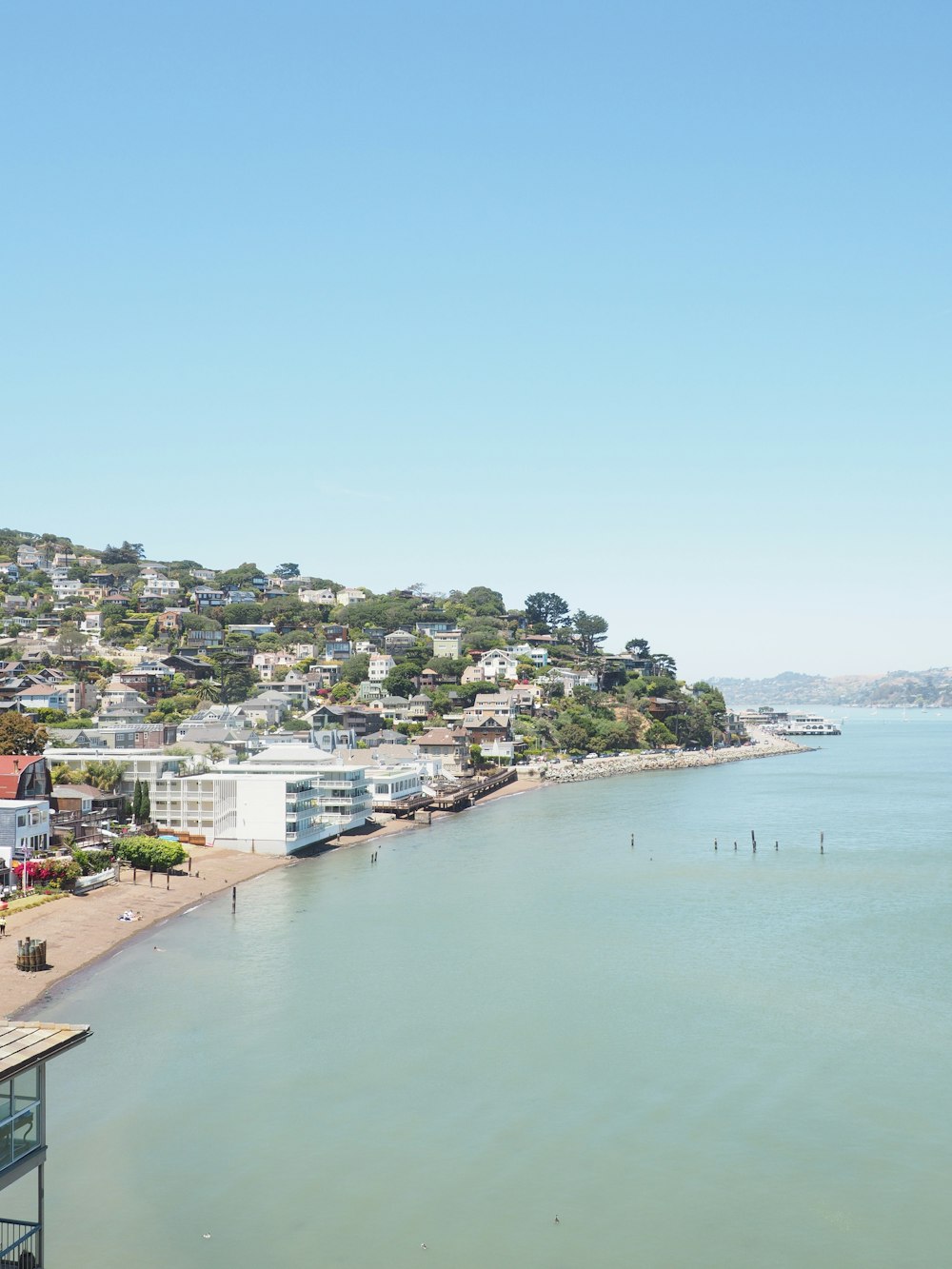 houses near body of water during daytime