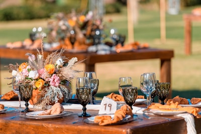 clear wine glasses on brown wooden table