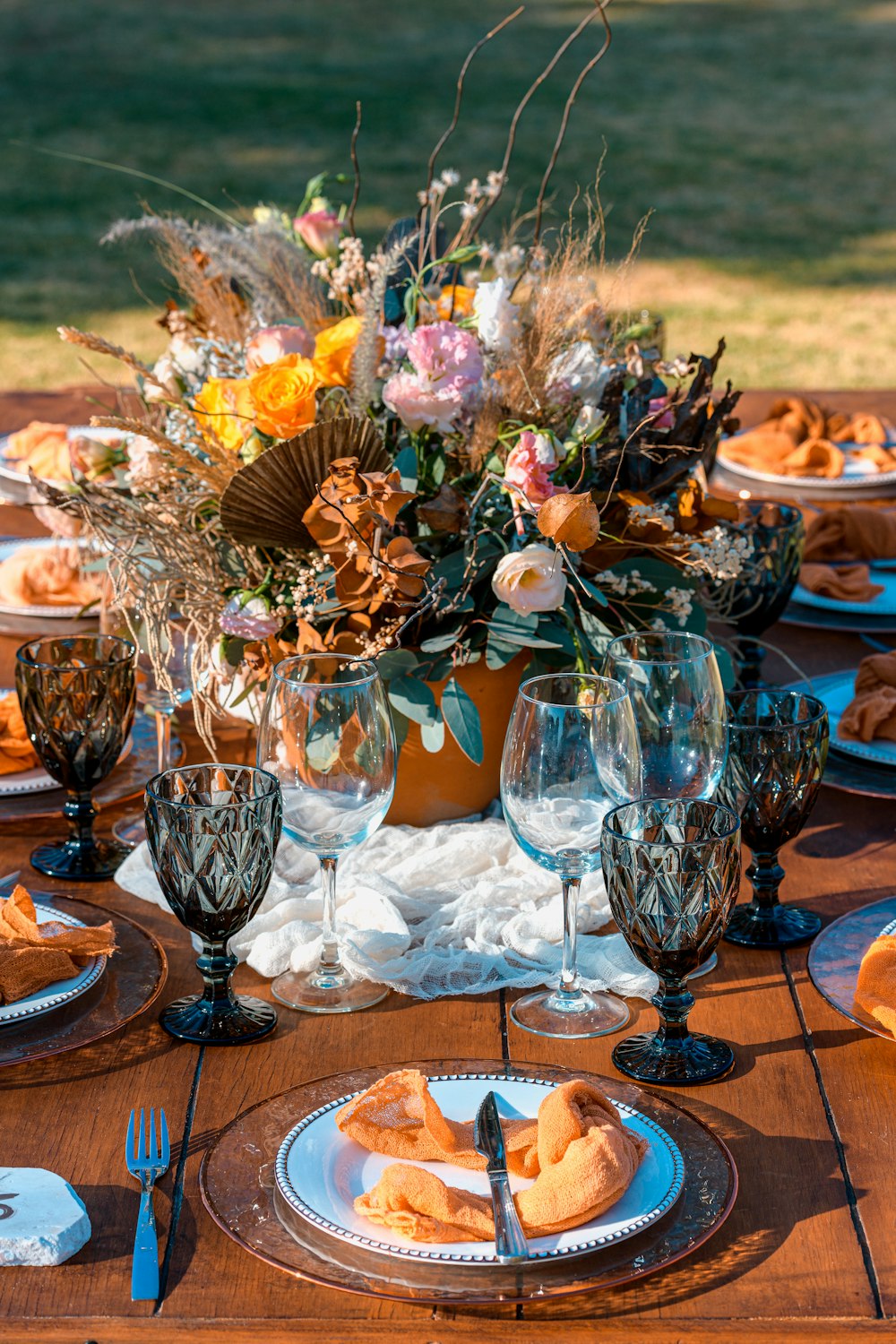 clear wine glass on brown wooden table