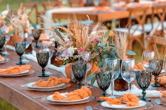 pink flowers in clear glass vase