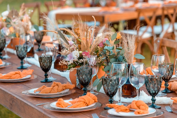 pink flowers in clear glass vase