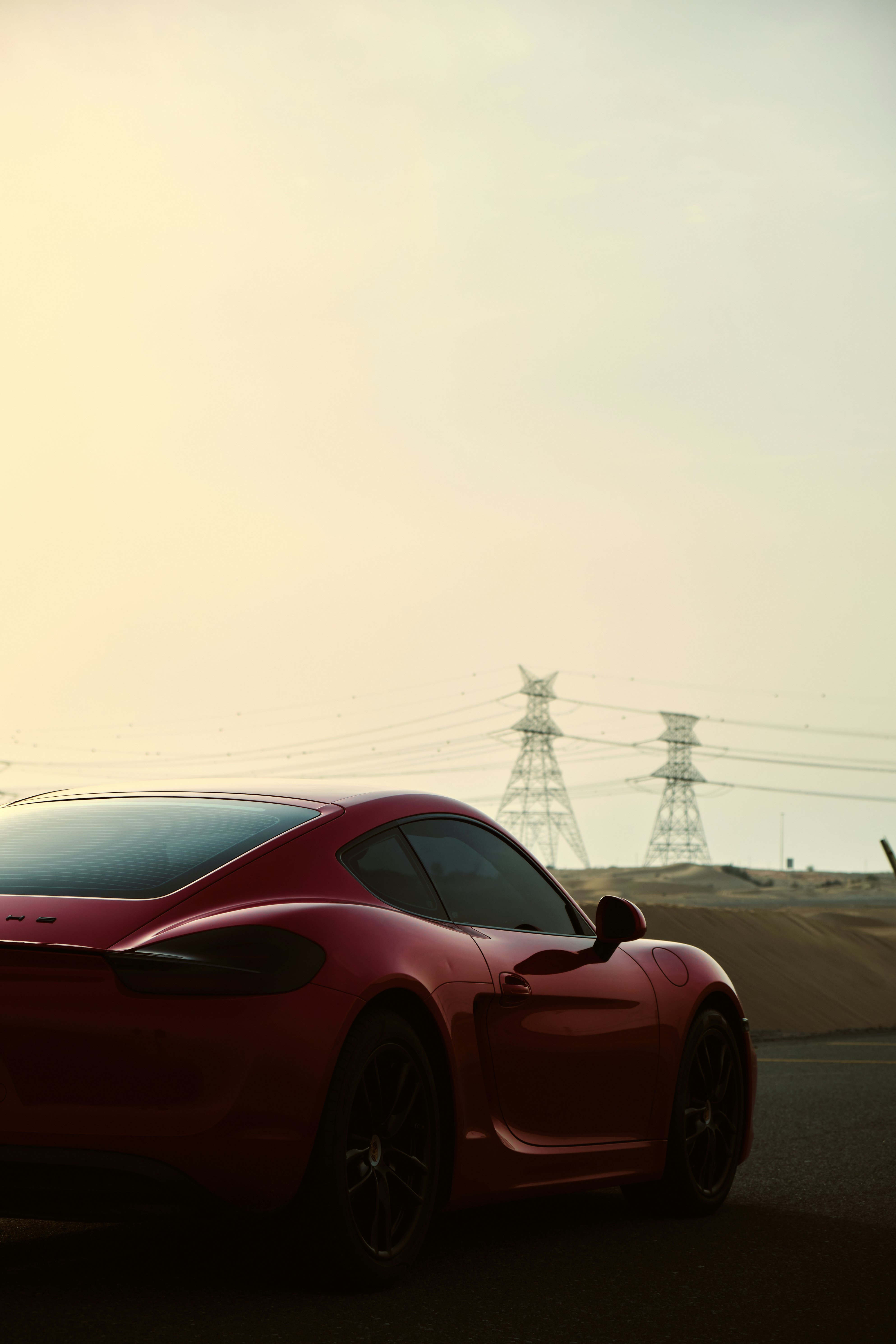 red ferrari sports car on road during daytime