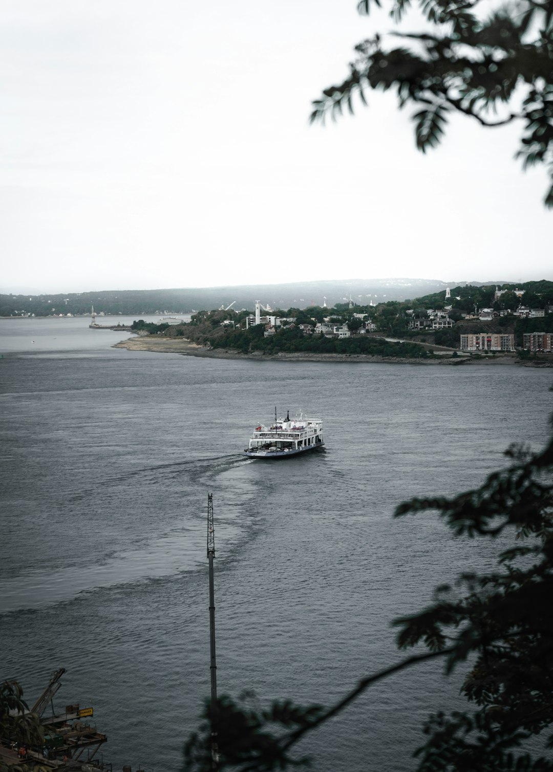 white boat on sea during daytime