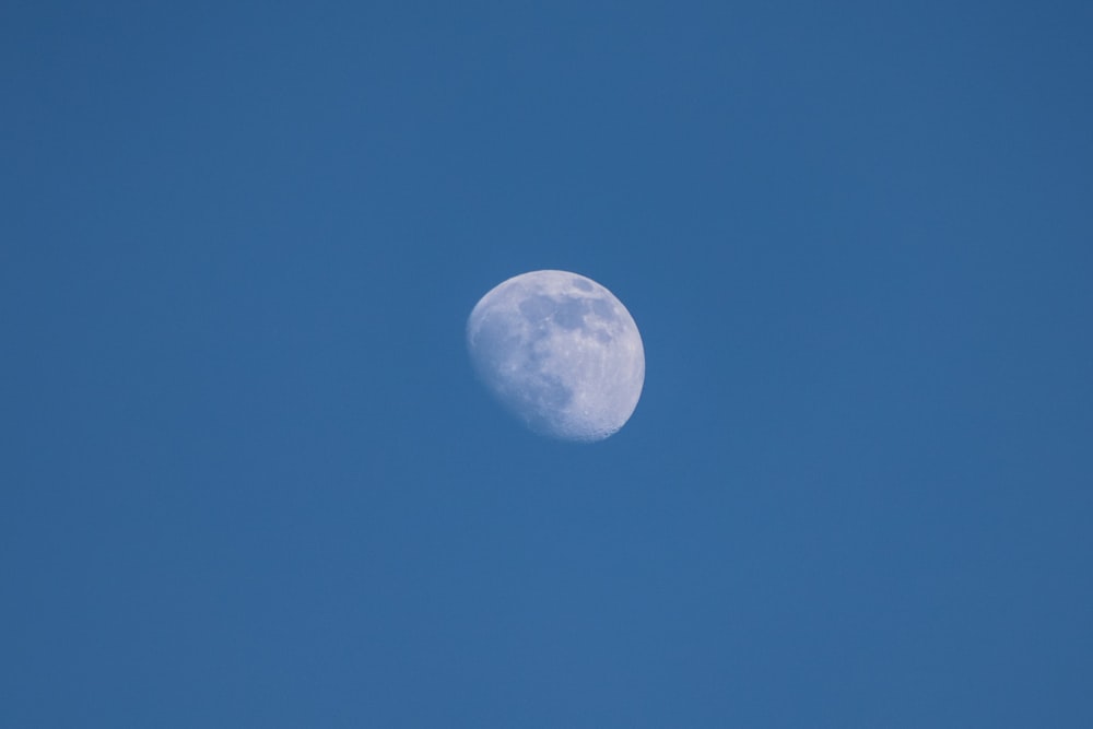 full moon in blue sky