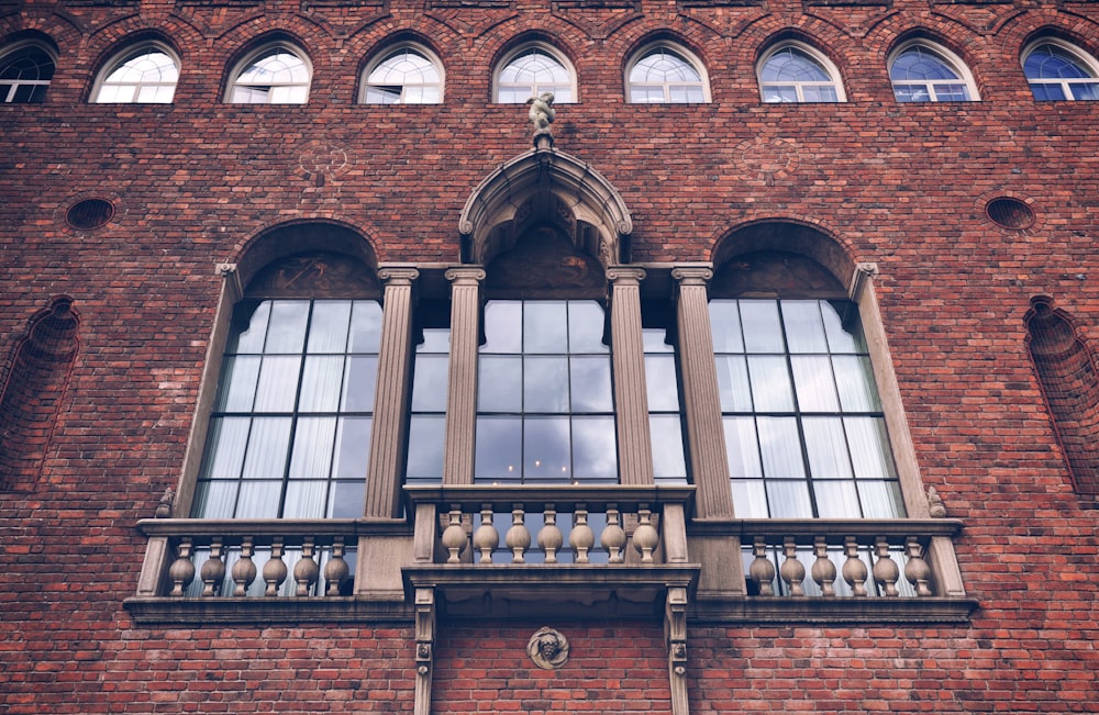 brown wooden framed glass window