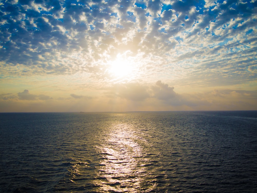 blue sea under blue sky during daytime