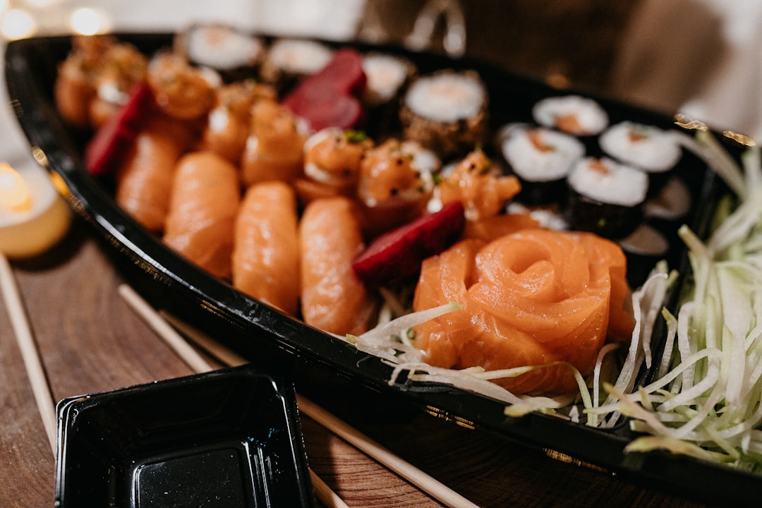 sushi on black ceramic plate