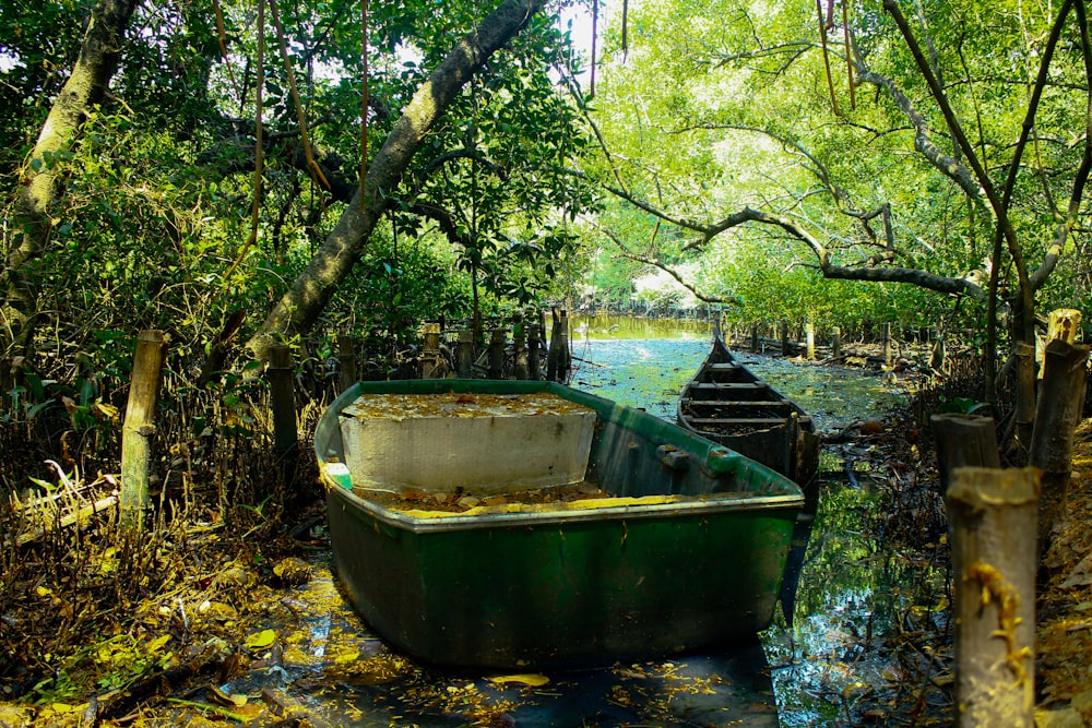 blue and white boat on river