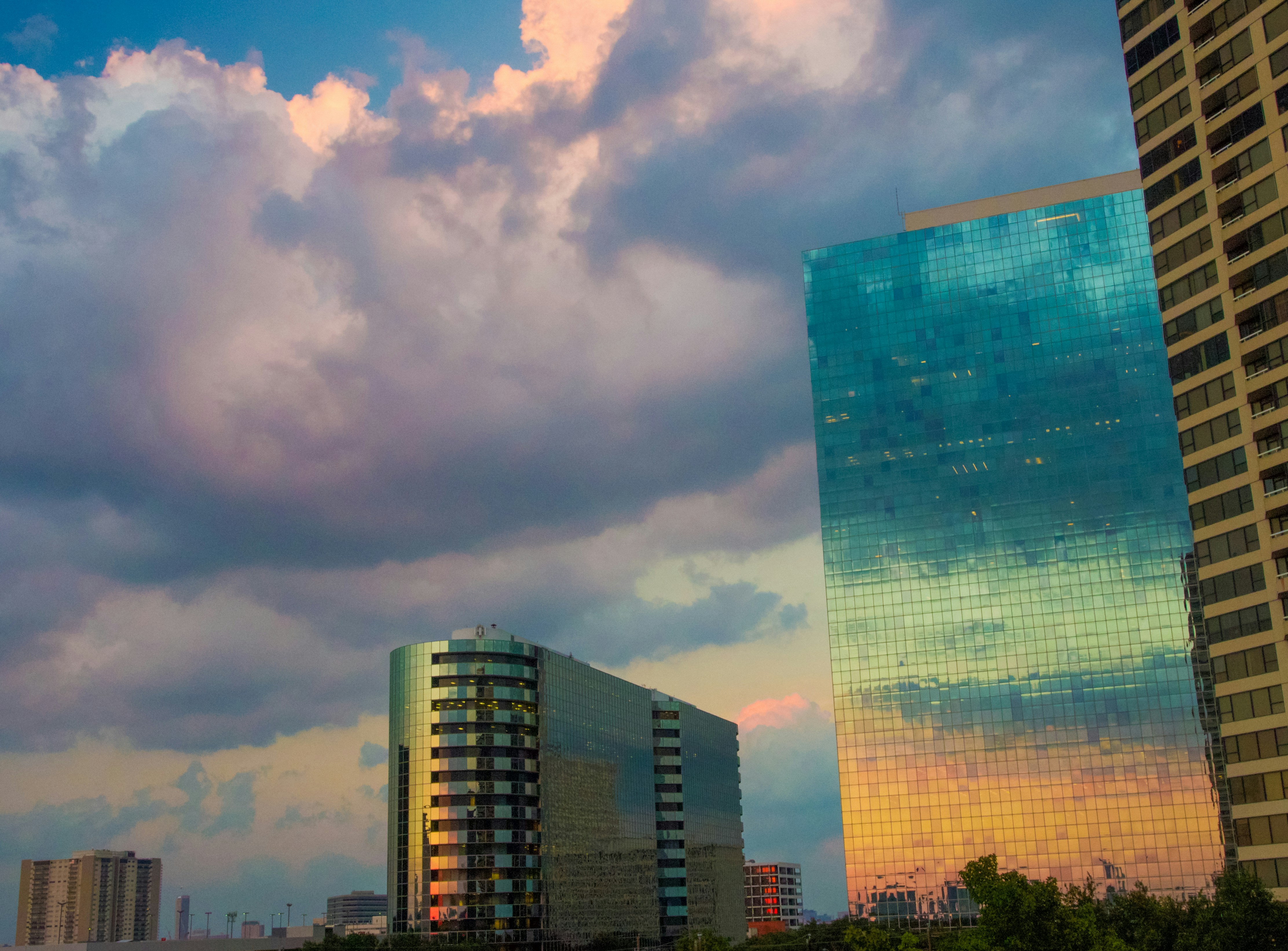 blue and white building under cloudy sky during daytime