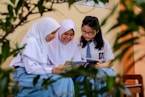 man and woman in white hijab