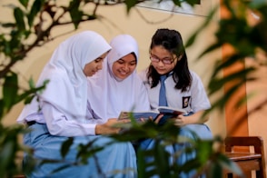 man and woman in white hijab