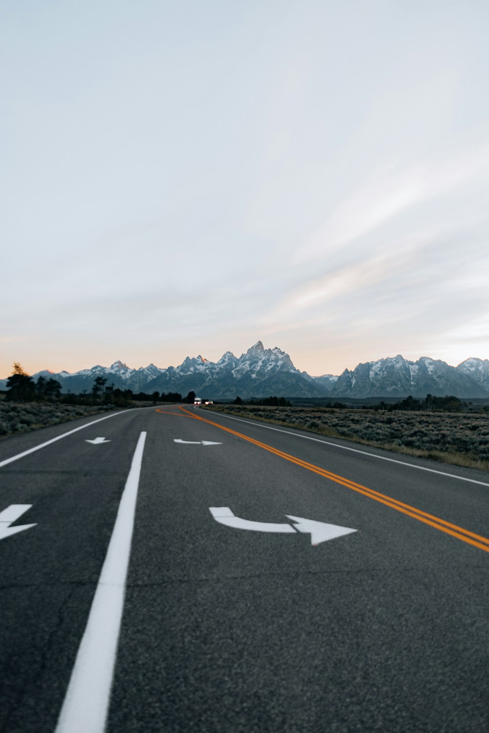 gray concrete road with no cars during daytime