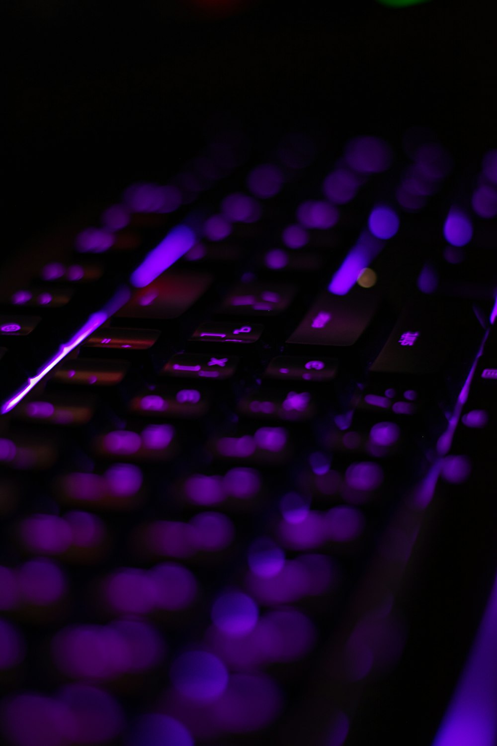 purple and black computer keyboard