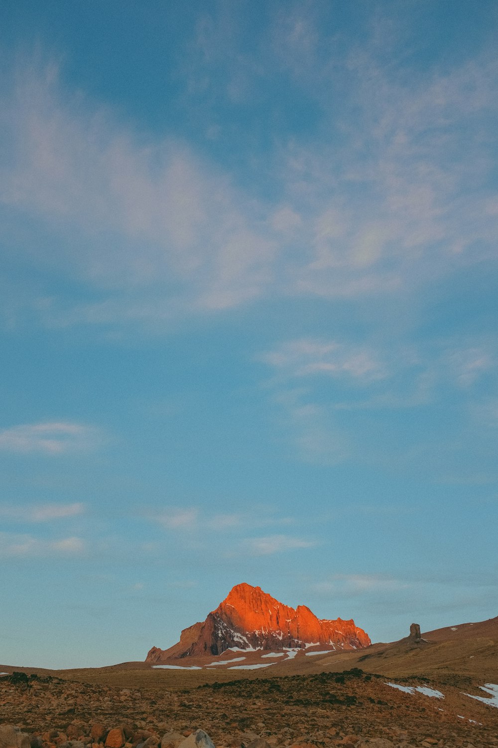 brown mountain under blue sky during daytime