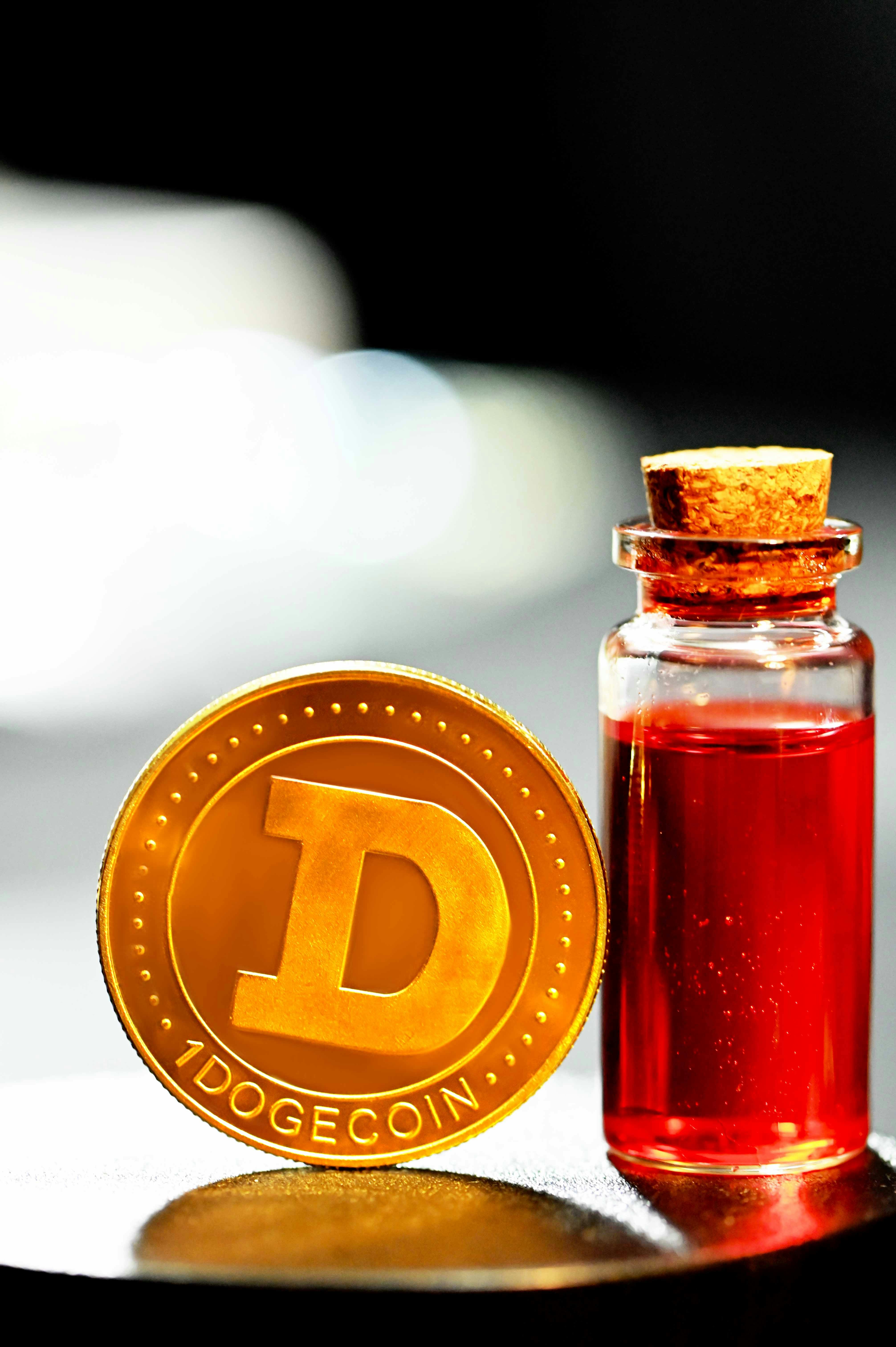 red glass bottle with gold lid