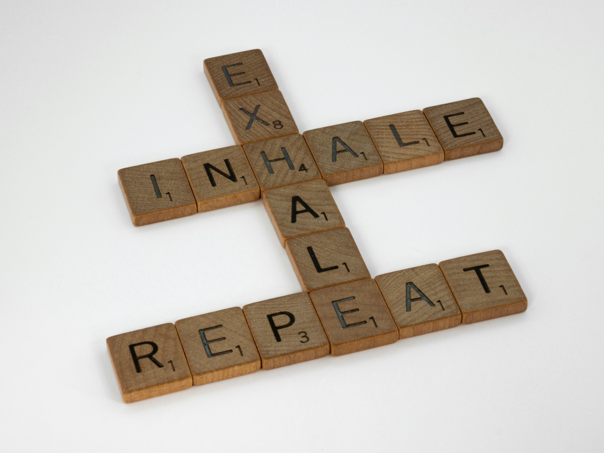 scrabble, scrabble pieces, lettering, letters, wood, scrabble tiles, white background, words, quote, letters, type, typography, design, layout, focus, bokeh, blur, photography, images, image, inhale, exhale, repeat, keep going, breathe, life rhythm, relax, persistence, perspective, endurance, pause, 