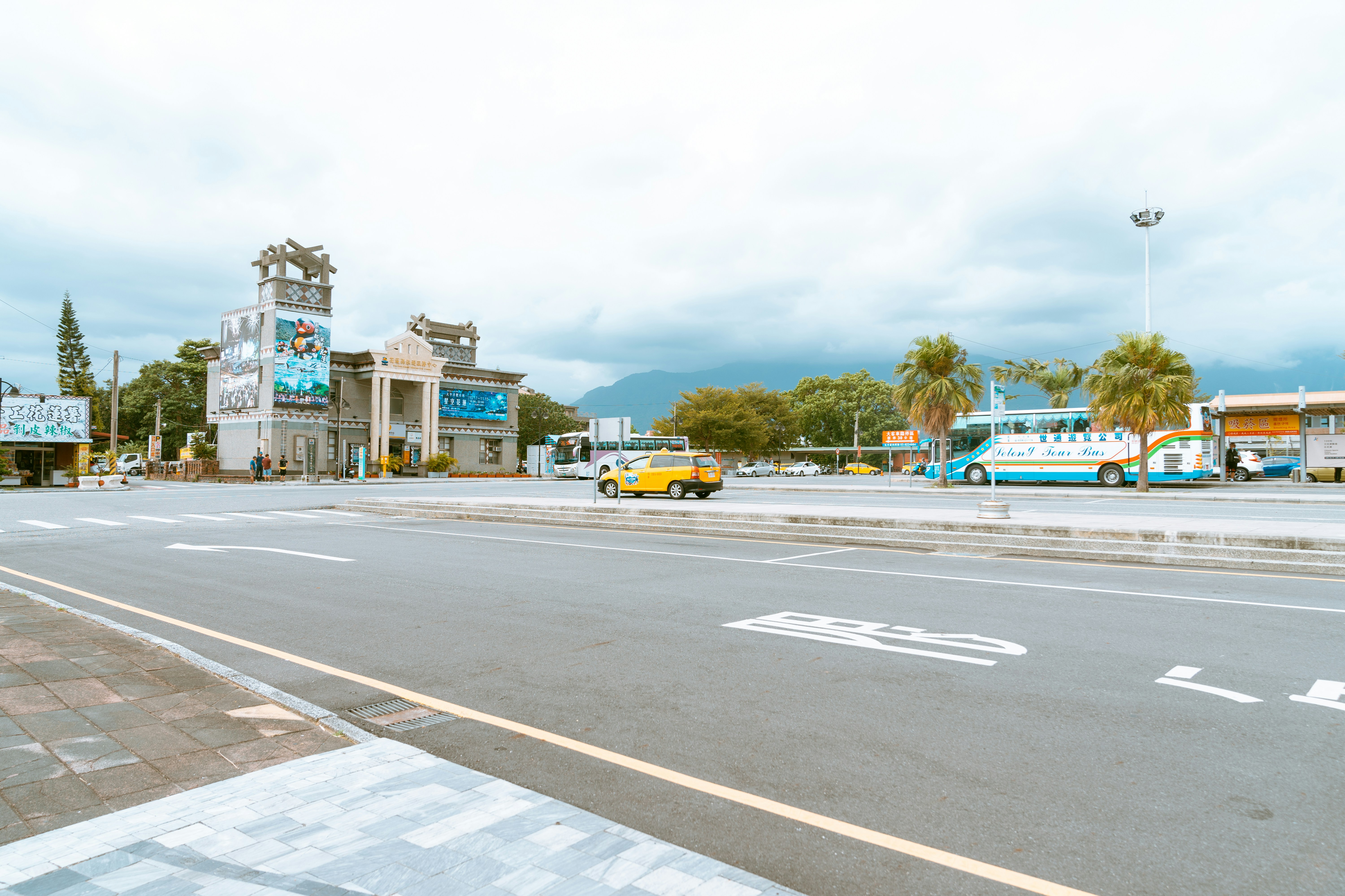 yellow car on road during daytime