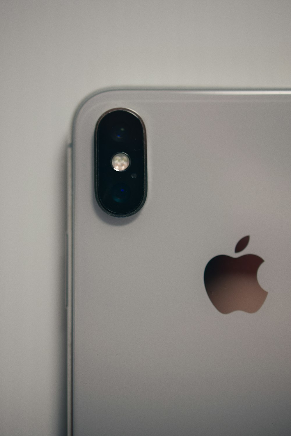 silver iphone 6 on white table