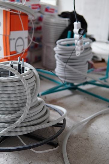 white coated wire on table