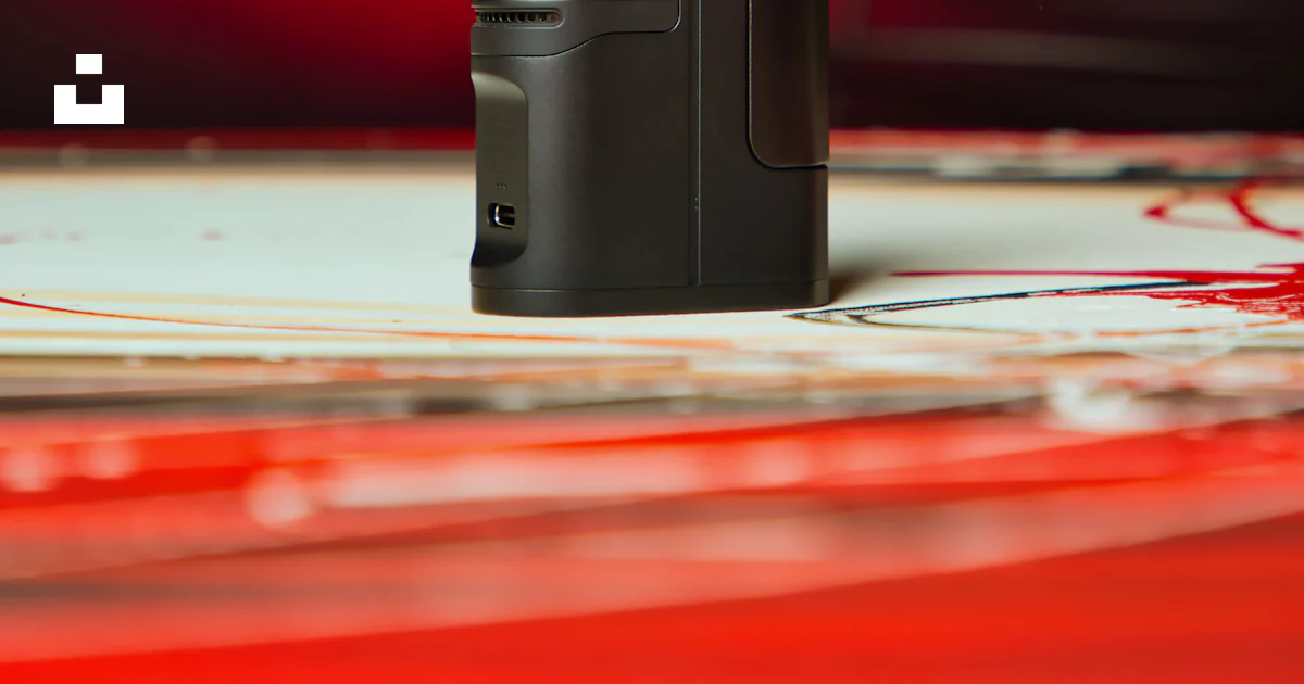 Black box mod on white and red textile photo – Free Abyss Image on Unsplash