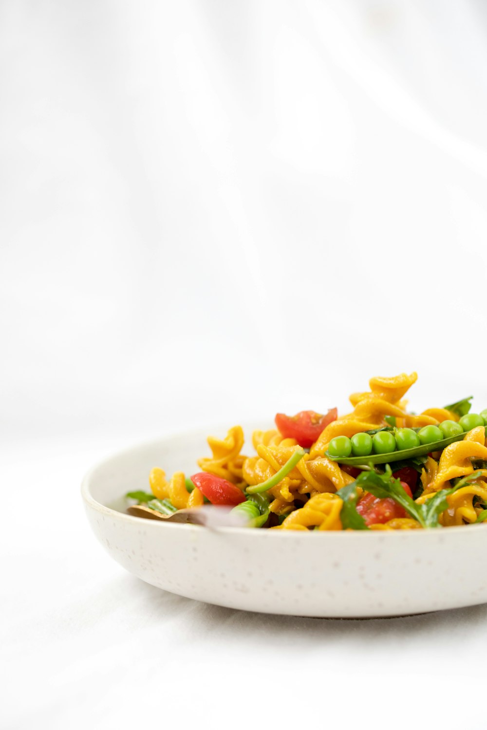 white ceramic bowl with pasta