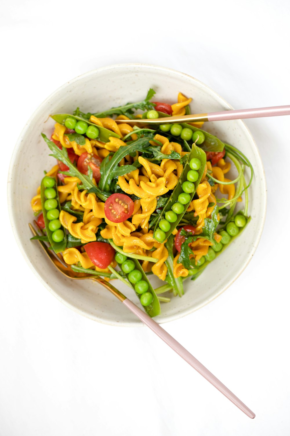 green and yellow vegetable salad in white ceramic bowl