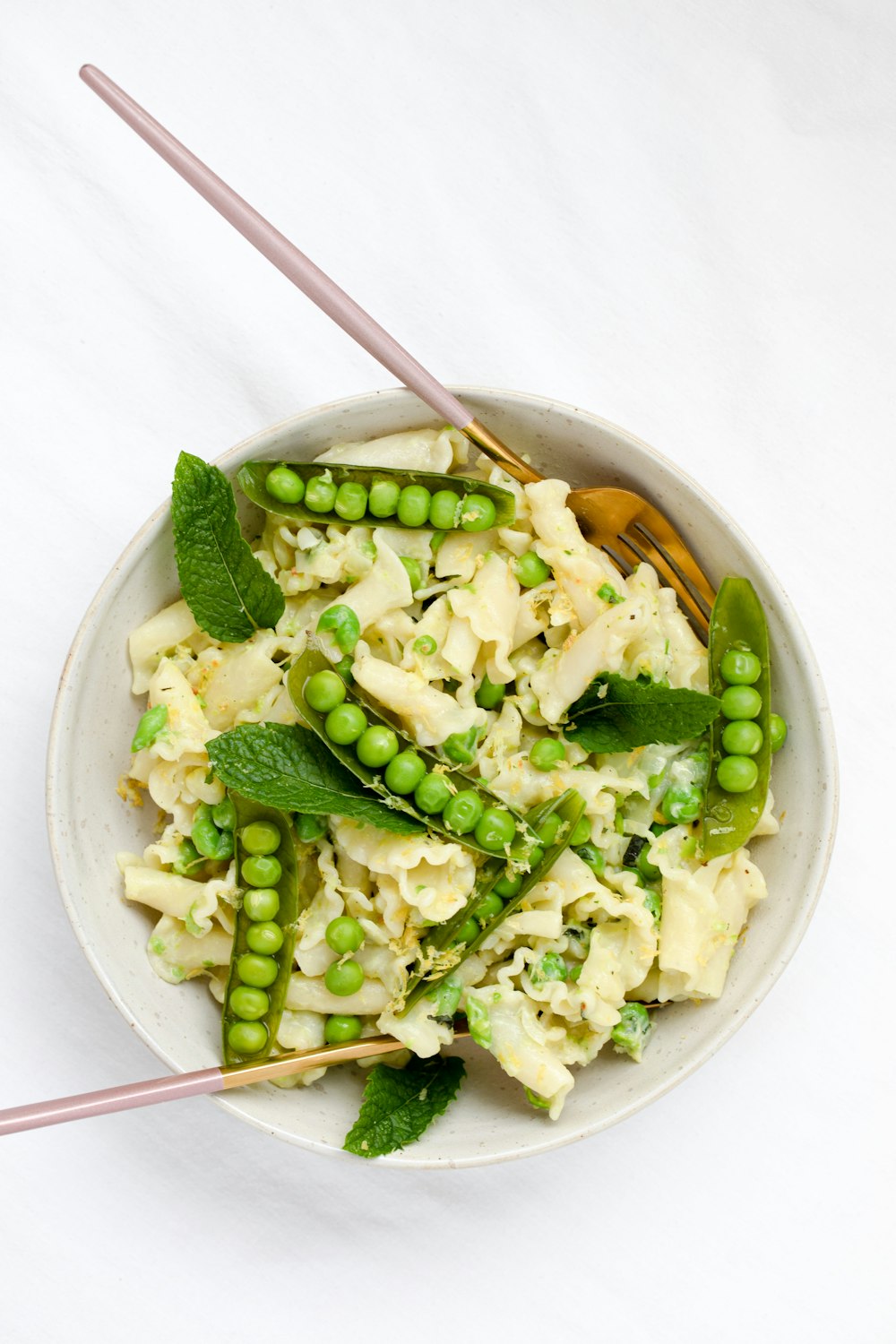 green beans on white ceramic bowl