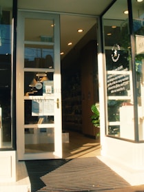 Modern storefront with large glass windows and a welcoming entrance