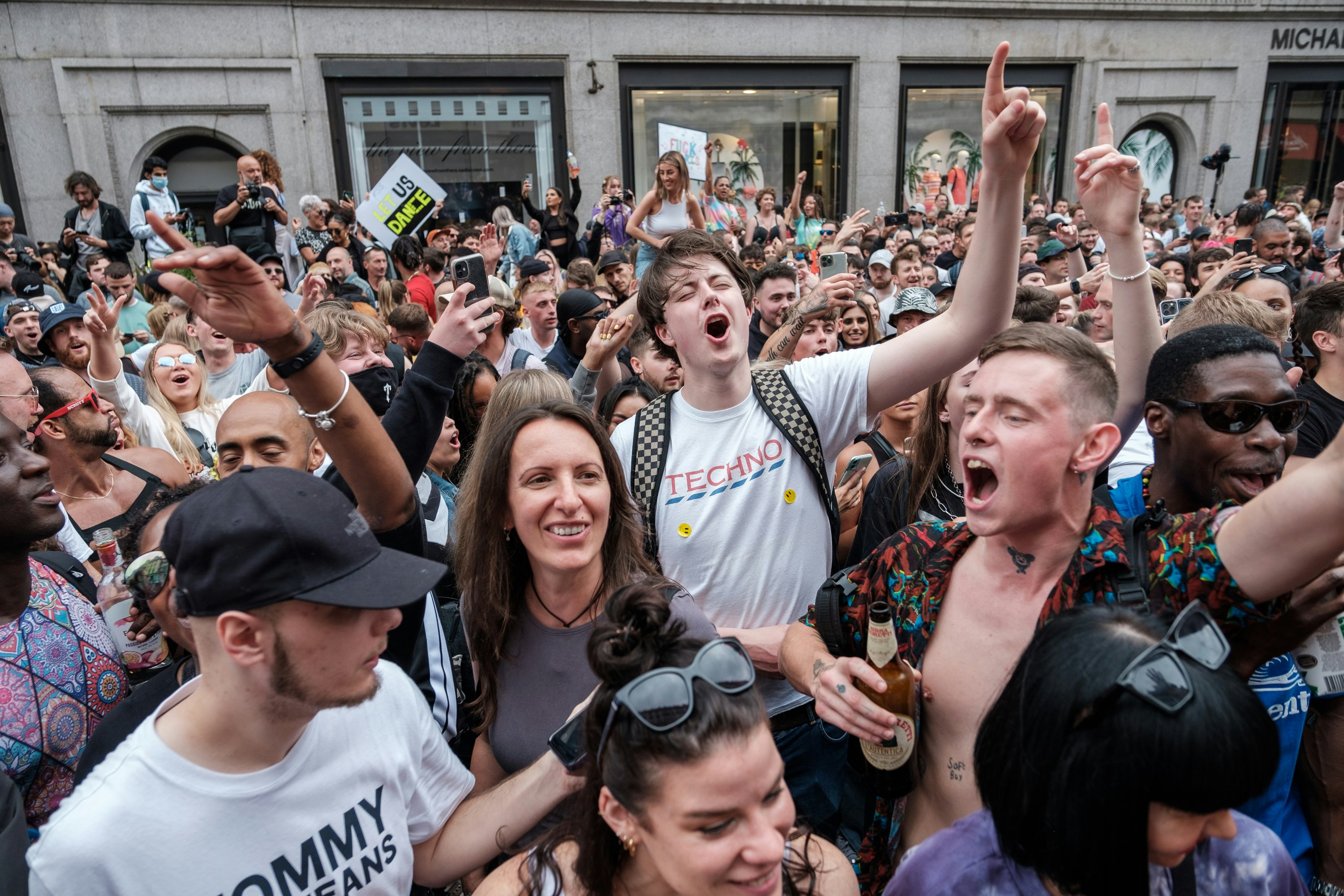 group of people in white crew neck shirt