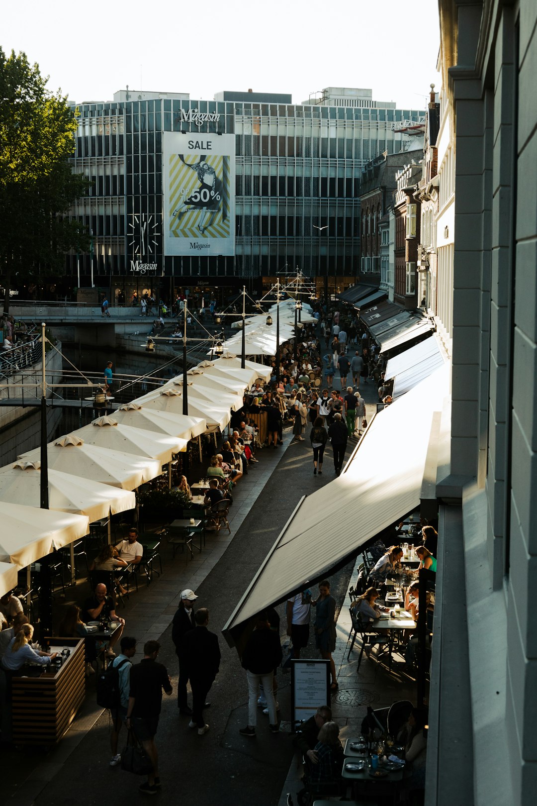 people sitting on white bench during daytime