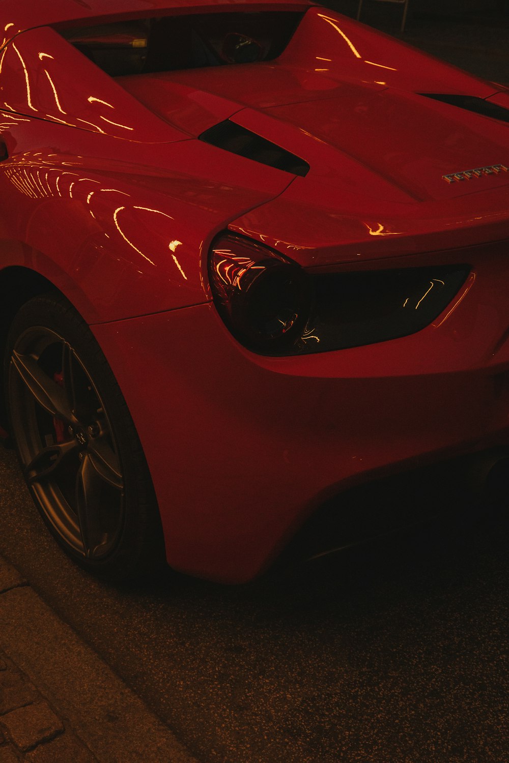 red ferrari 458 italia on road